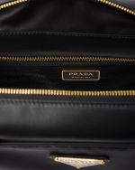 Re-Nylon and Leather Medium Top-Handle Bag With Padlock - Image 4